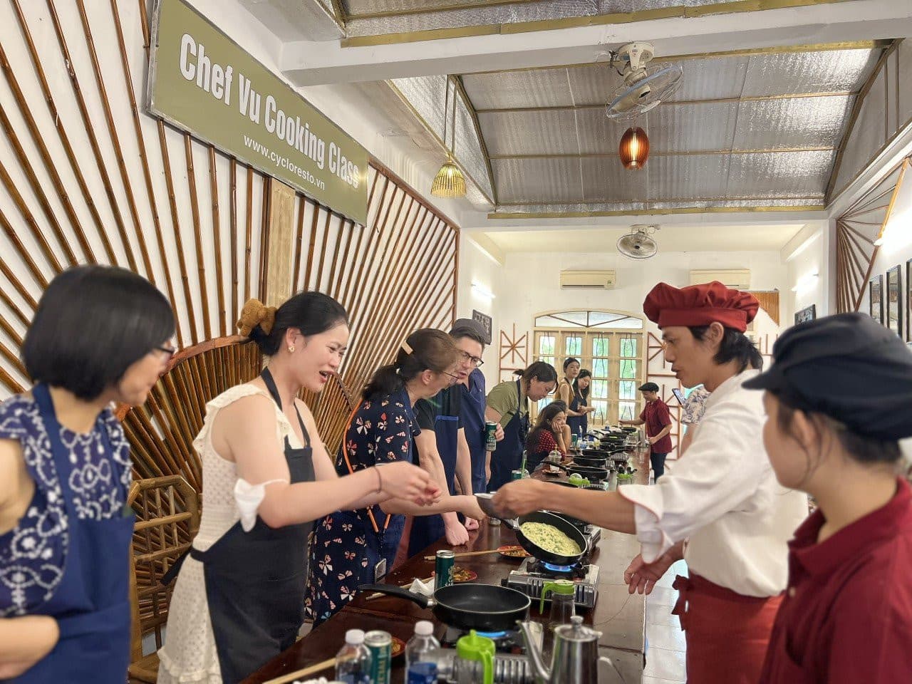 Chef Vu Cooking Class with Market Tour and Cyclo Ride - 이미지 3