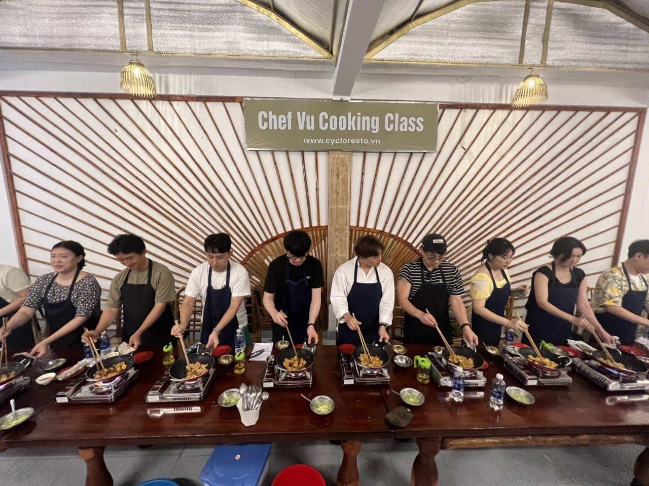 Chef Vu Cooking Class with Market Tour and Cyclo Ride - 대표 이미지
